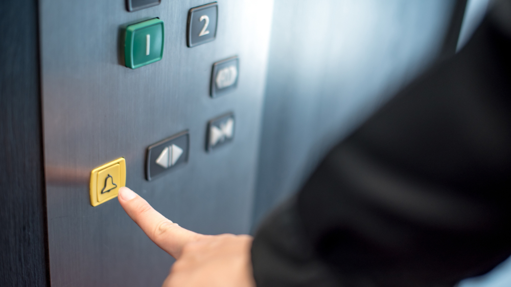 Lift alarm press